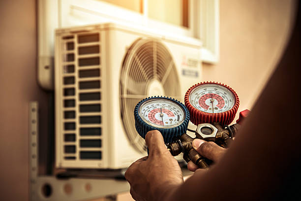 Professional Air Conditioning Service technician working in Loris, SC